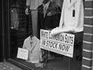 communions suit storefront window